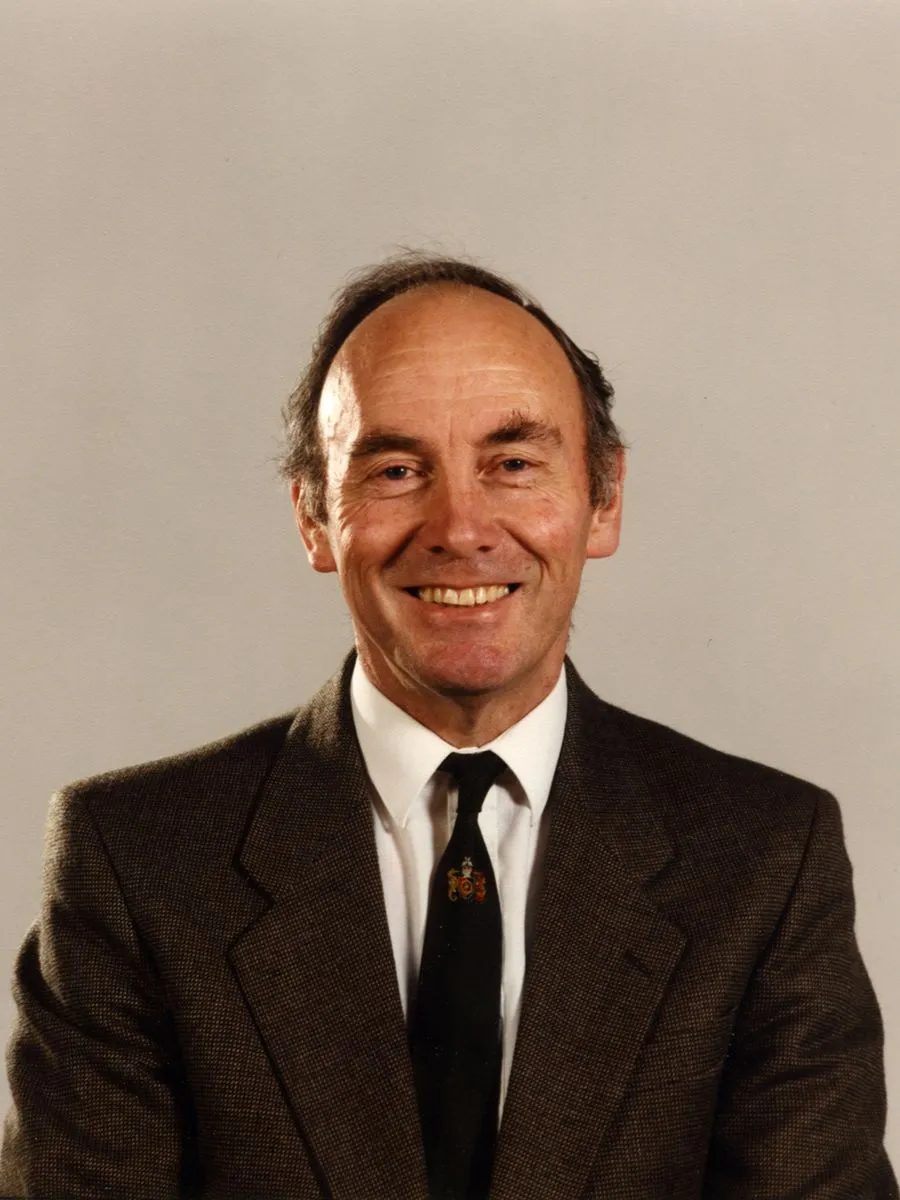 John Richard Pentland deceased John Pentland smiling to camera in suit, shirt and tie