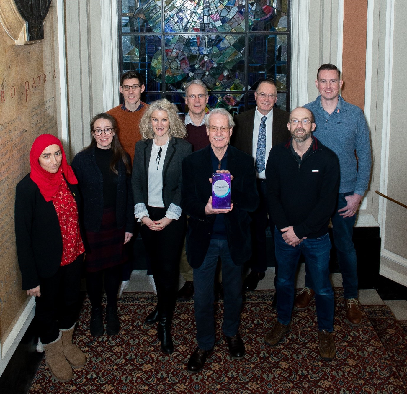 The Molecular Spectroscopy Group Committee celebrate with their RSC Inspirational Committee Prize award at Burlington House