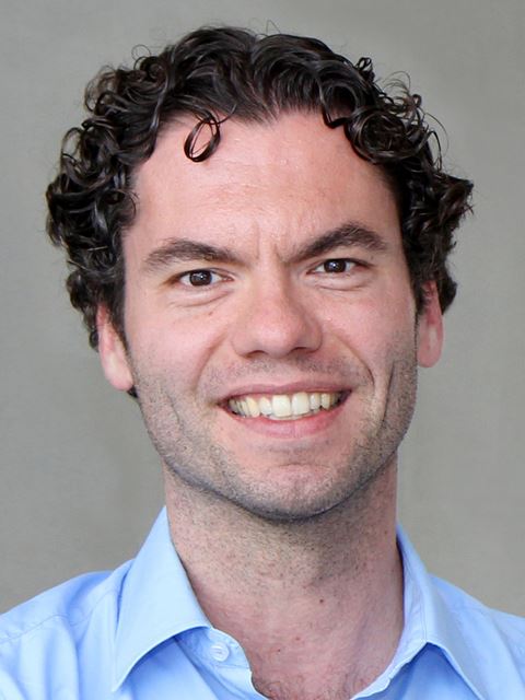 Christian Hackenberger smiling to camera