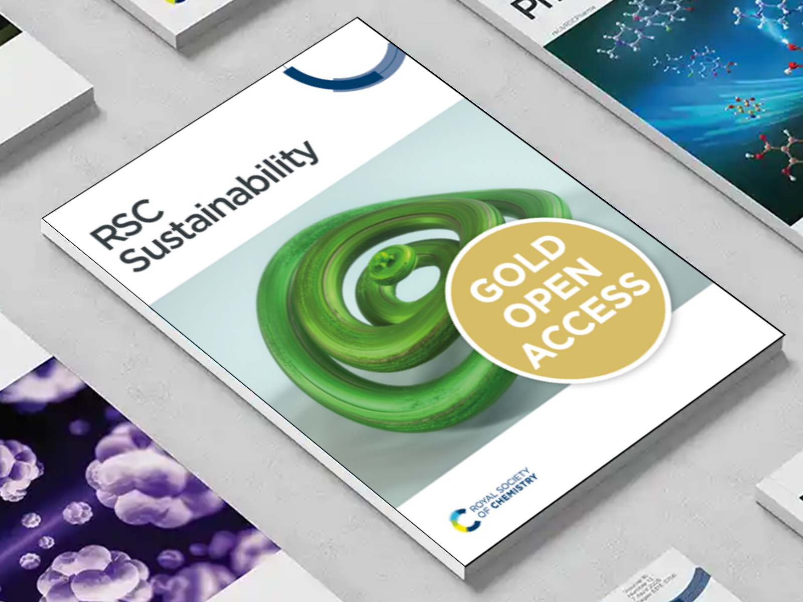 the RSC Sustainability journal among a group of other journals on a desk
