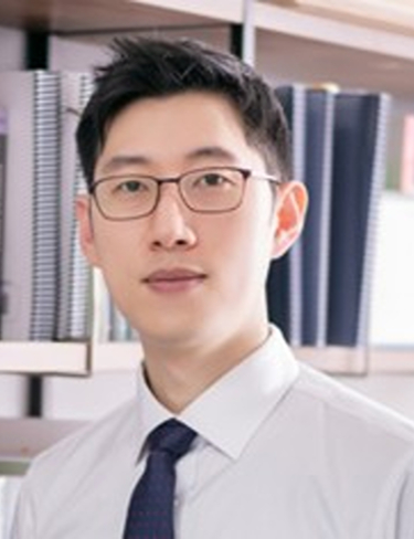 Headshot of Jongwoo Lim, looking at the camera wearing eyeglasses and white shirt