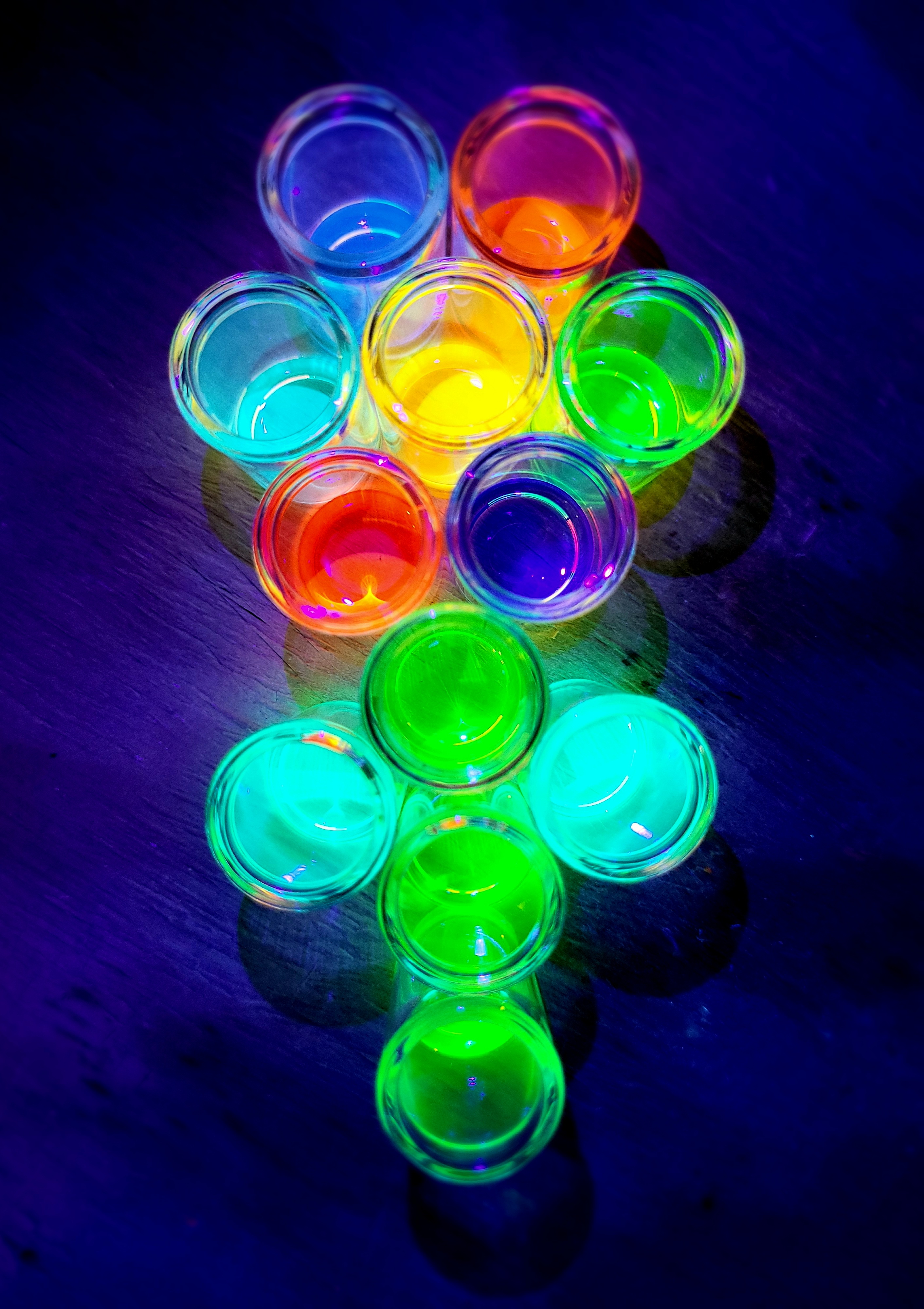 Maciek Majdecki's 'Flower Composted of Fluorescent Compounds'  shows a series of fluorescent tubes arranged in the shape of a flower on a blue background