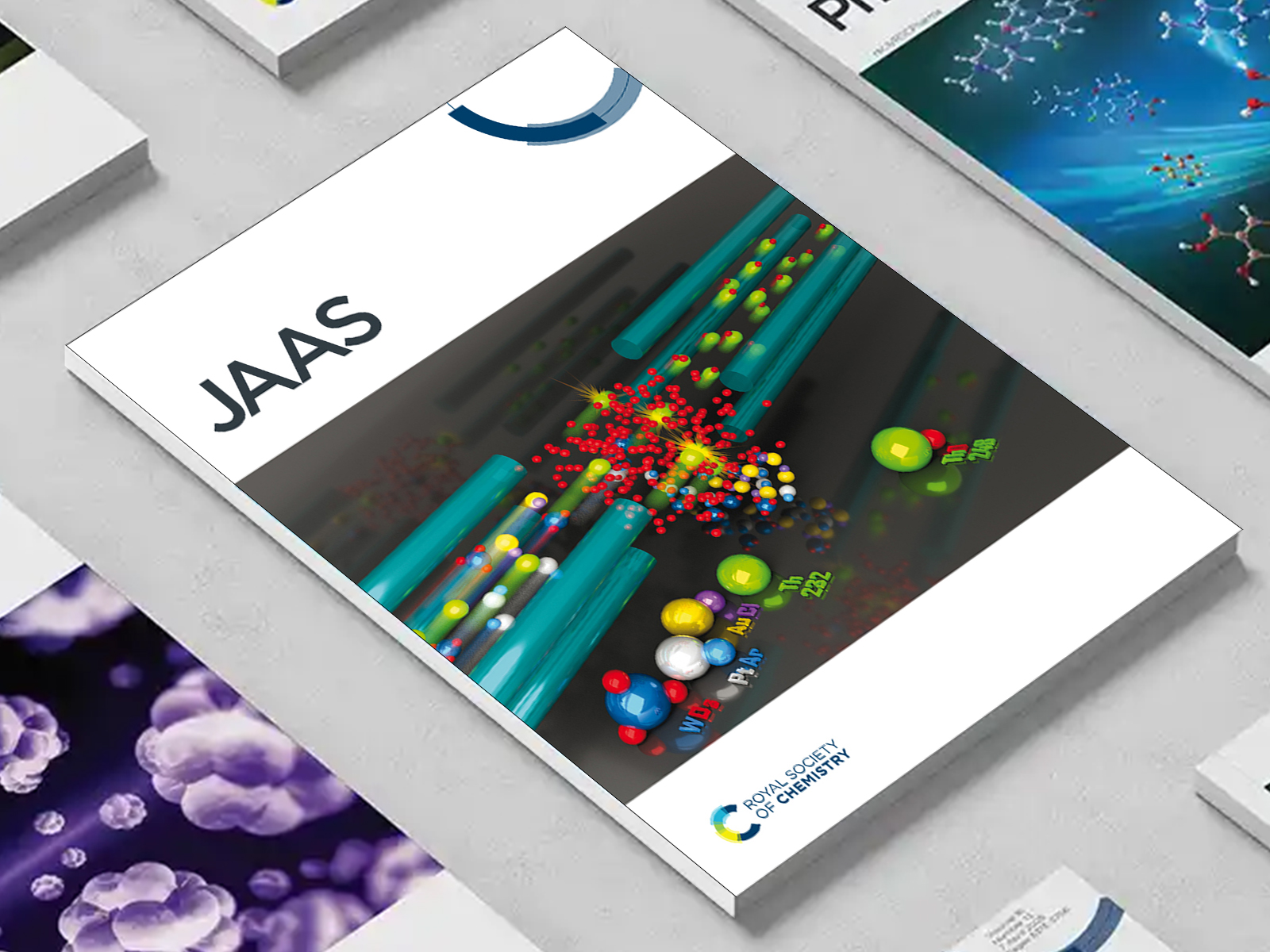 the JAAS journal among a group of other journals on a desk