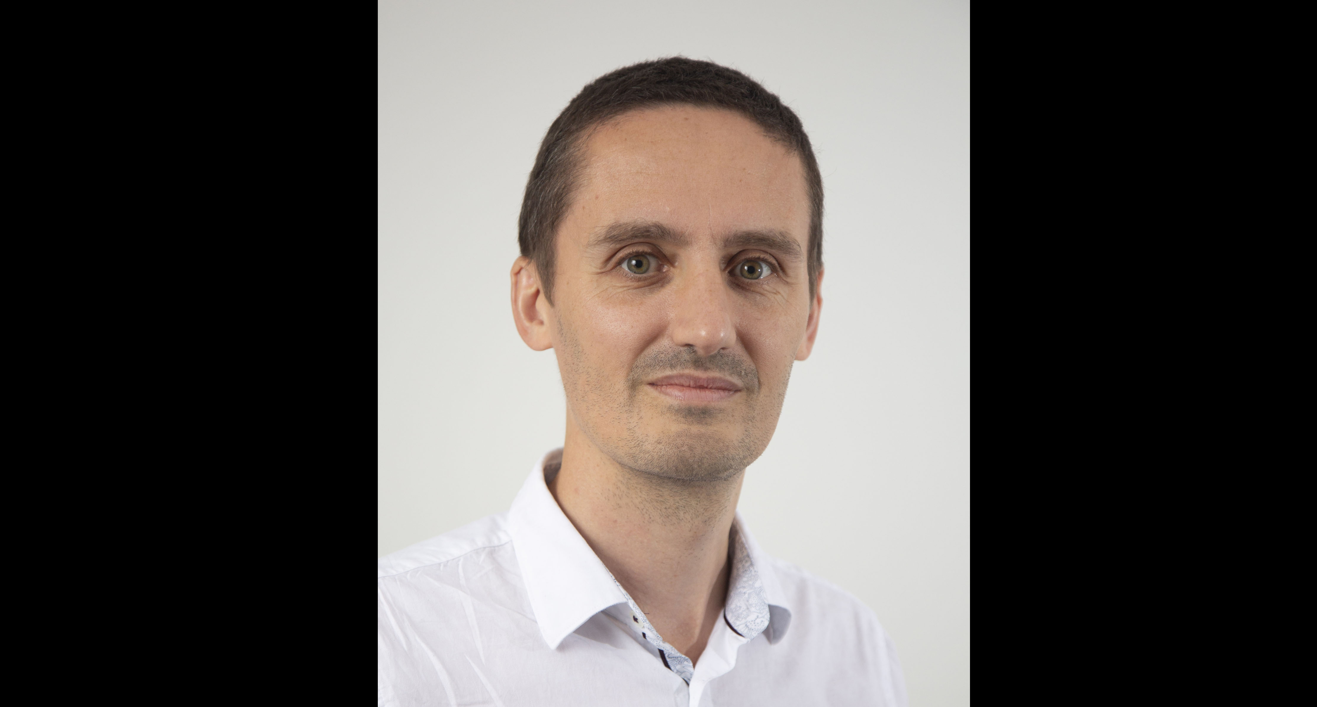 Professor Stephen Goldup in a white shirt