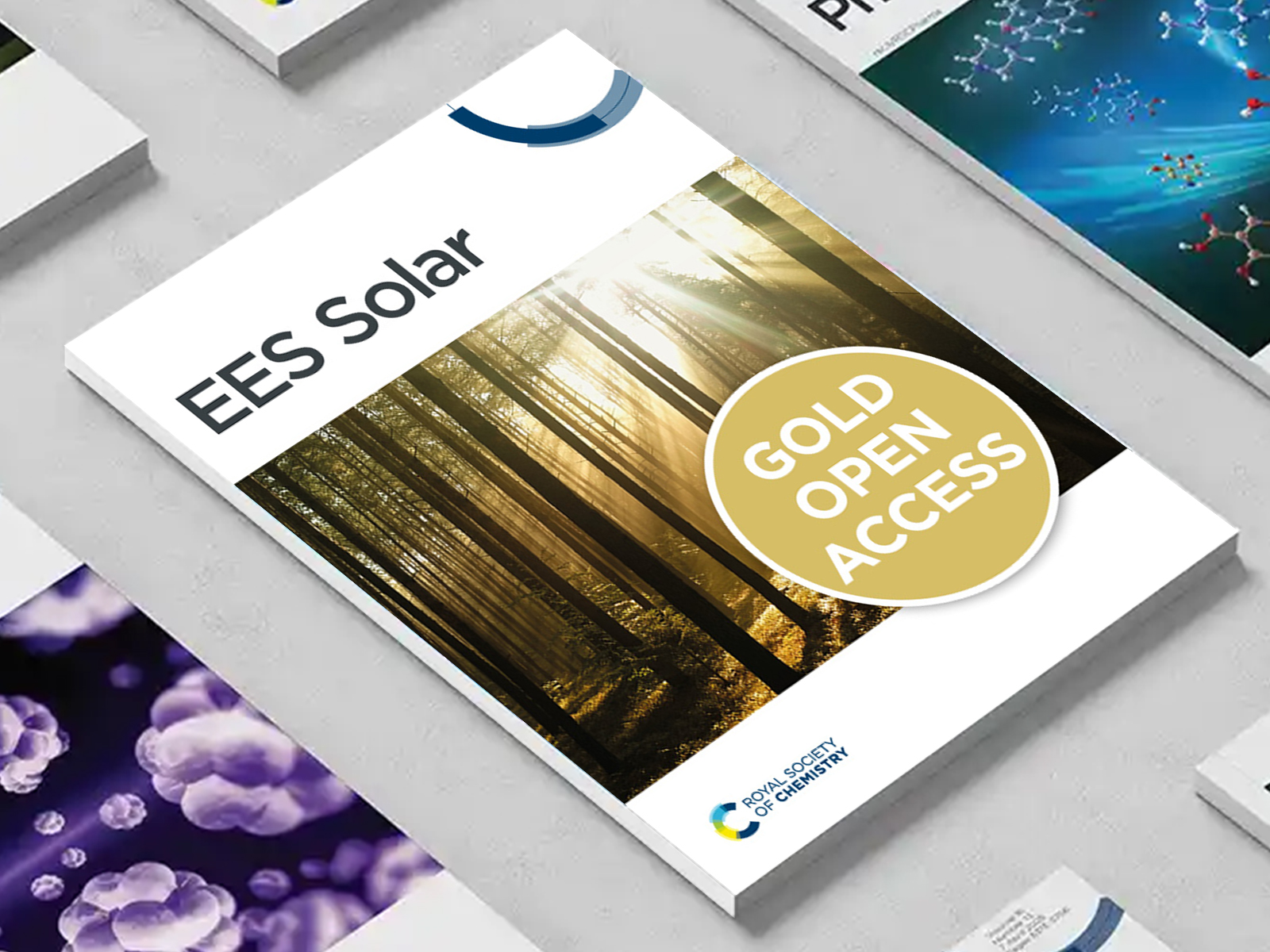 the EES Solar journal among a group of other journals on a desk