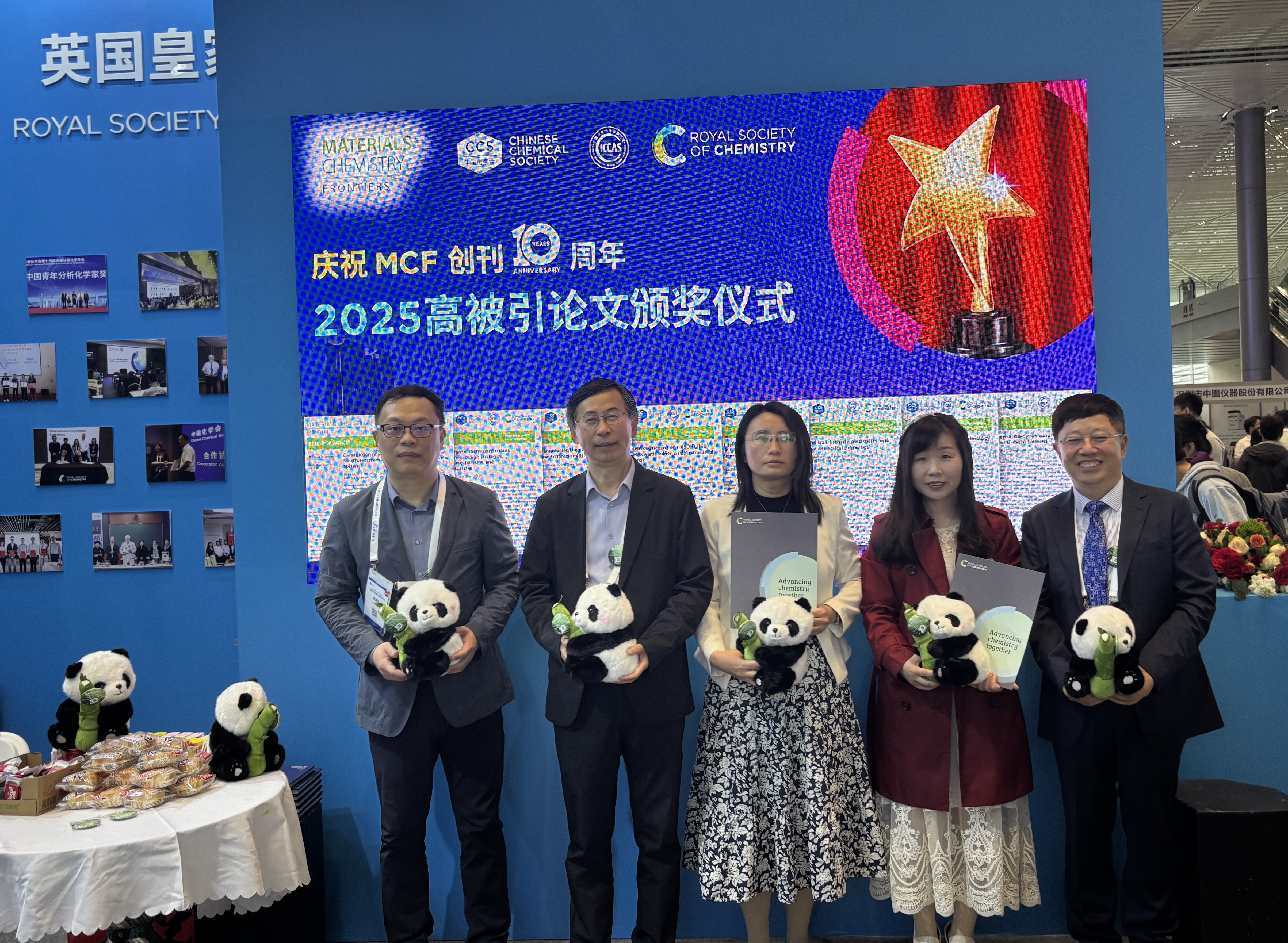 Journal Anniversary - 1 (RSC in China 2026) a group of people holding stuffed pandas