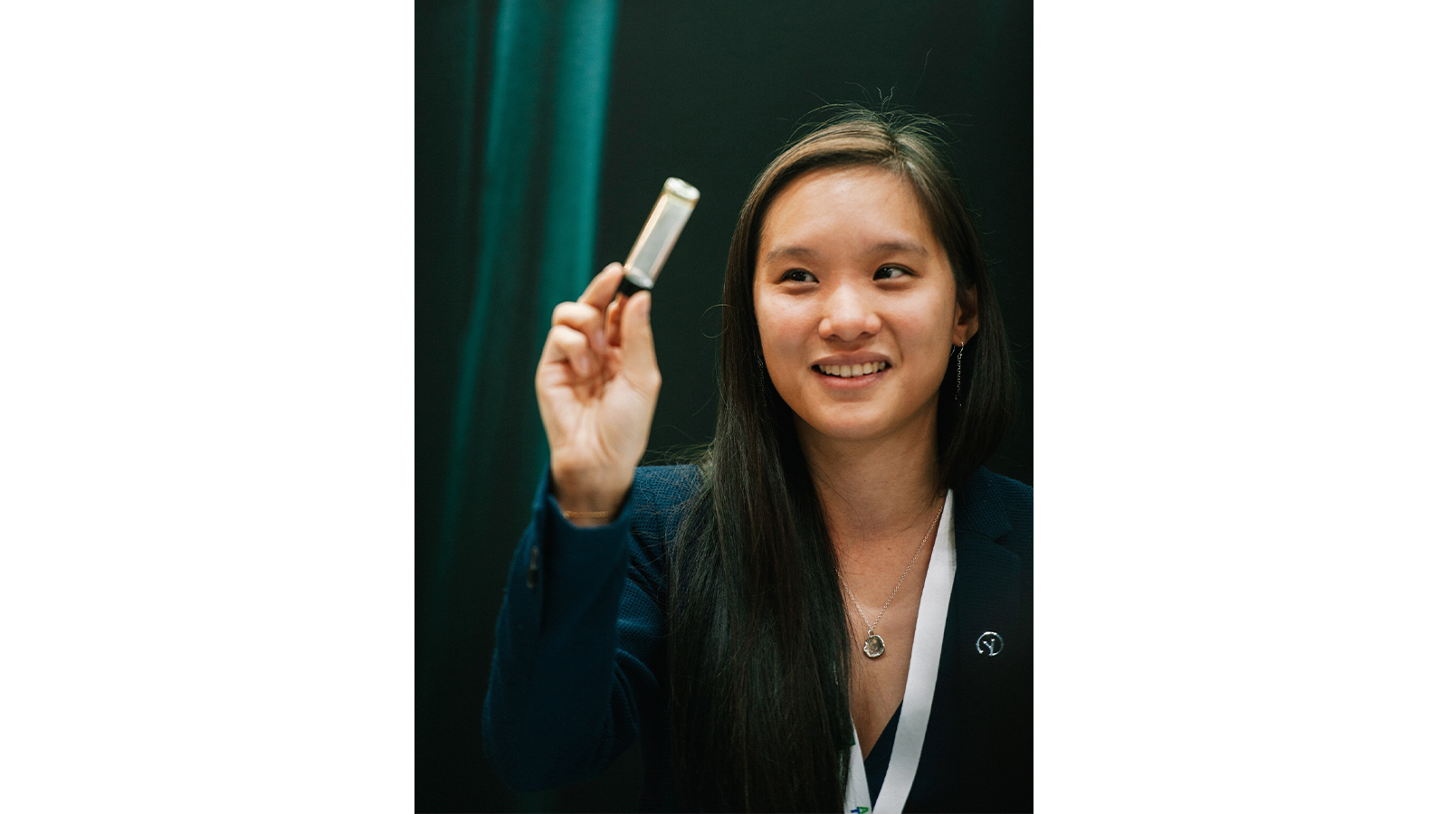 Dr Florence Huynh in a suit, smiling
